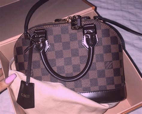 louis vuitton alma original vs fake|false louis vuitton alma.